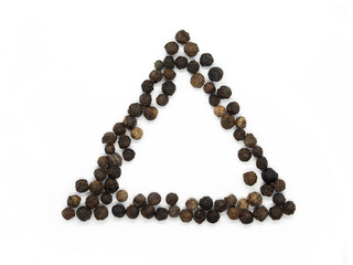 Black pepper triangle, border or frame. Isolated tasty, background herb, spice,  peppercorn for social media banner.