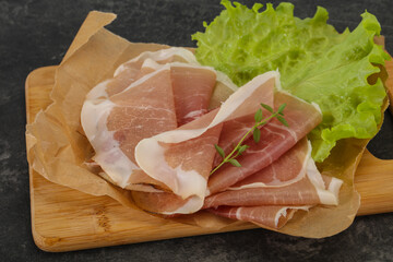 Italian prosciutto pork meat over board