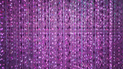 Purple stage background of LED flashing and flickering bulbs.