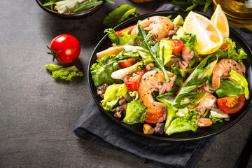 Seafood salad with leaves and vegetables.