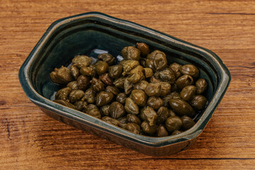 Tasty capers in the bowl