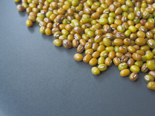 Mung bean, Green moong dal on black background.