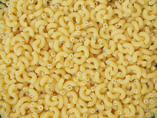 Close up of italian macaroni pasta food background. Raw Macaroni.