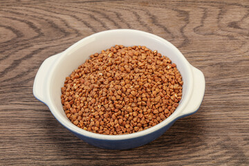 Raw buсkwheat cereal in the bowl