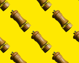 Pepper mill pattern on yellow background