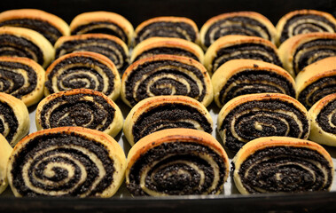 baked pieces of poppy seed strudels close up