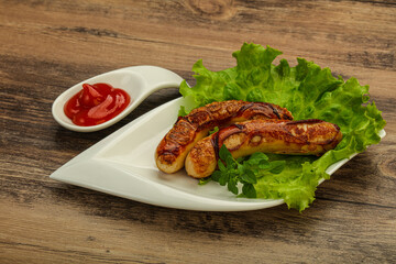 Roasted chicken white sausages with ketchup
