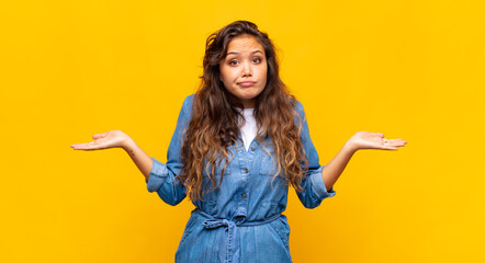  feeling puzzled and confused, doubting, weighting or choosing different options with funny...