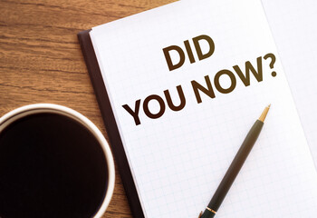 DID YOU NOW? - Concept of text at notepad with pen on wooden table