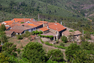 View of a typical northern Portuguese village, stone masonry houses and orange tile roofs in the...