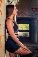 Naklejka premium Young girl posing in a fashion way