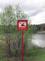 Russia, Moscow / may, 2019: "Swimming is prohibited" sign in Izmailovsky Park on the Bank of Lebedyansky pond
