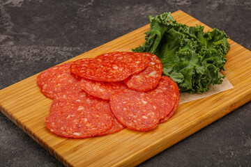Italian spycy pepperoni sausage slices