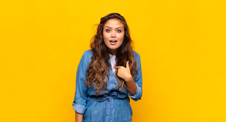  looking happy, proud and surprised, cheerfully pointing to self, feeling confident and lofty