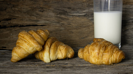croissants on old wooden table