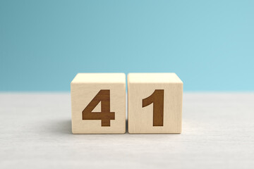 Wooden toy blocks forming the number 41
