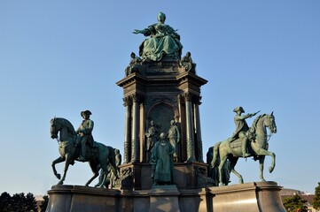 Fototapeta na wymiar Maria Theresa bronze statue with blue sky in the background, Vienna, Austria
