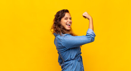  feeling happy, satisfied and powerful, flexing fit and muscular biceps, looking strong after the...