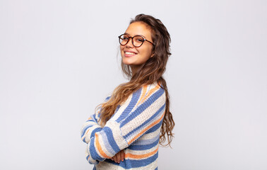  smiling to camera with crossed arms and a happy, confident, satisfied expression, lateral view