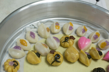 Korean traditional food various shapes of half moon shaped rice cake.
