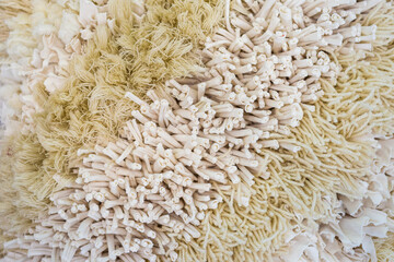 Closeup white fabric and yarn thread background, pillow cover design, fabric texture background