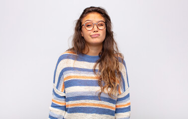  looking happy and friendly, smiling and winking an eye at you with a positive attitude