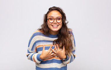  looking happy, surprised, proud and excited, pointing to self