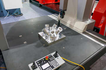 The Coordinate Measuring machine , CMM probe measure dimension of the metal gear parts.