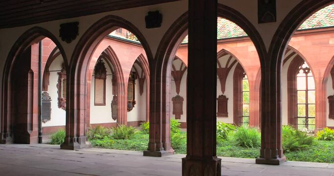 Basel Cathedral. Interior of Basel Minster.  The cloister, with inner garden, famous landmark, Switzerland