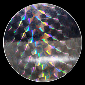 Macro Top Shot Of Holographic Foil Sticker With Cool Grid Pattern Texture, Holo Sticker On Real Paper Sheet Isolated On Black Background. 