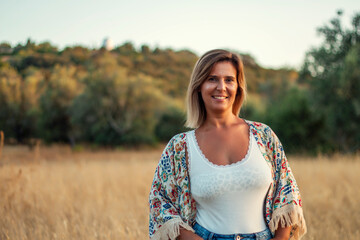 Beautiful girl posing on the countryside