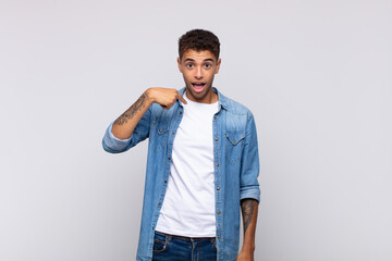  looking happy, proud and surprised, cheerfully pointing to self, feeling confident and lofty