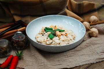 risotto with fresh cream, salted chicken, rehydrated ceps and mushrooms