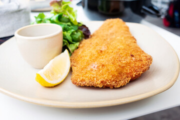 wiener schnitzel, veal cutlet and lemon, austrian cuisine