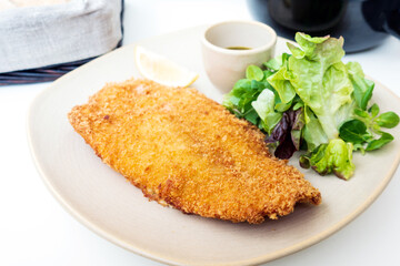 wiener schnitzel, veal cutlet and lemon, austrian cuisine