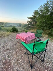 Collapsible chair and table camping in the nature