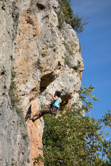 people practicing mountain climbing outdoors