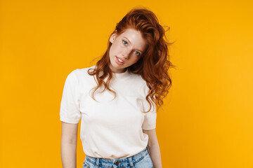 Obraz premium Image of ginger beautiful girl posing and looking at camera