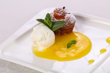Tasty hot muffin with ice cream