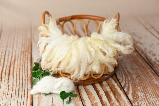 bamboo basket decorated with roses. basket for a newborn photo shoot. pink rose. basket