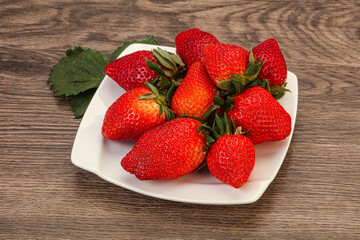 Ripe sweet strawberry with leaf