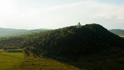 church isolated on the top of the hill on countryside