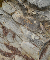 Stone texture tile. Ginger stone for background. Pieces of stone.