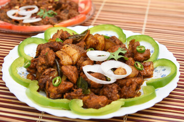 Spicy hot meat curry from Kerala India. beef buffalo pork pig lamb masala curry vindaloo. Indian food served rice, appam popular Lankan, Thailand, Malaysia, Asian. Indian spices, goulash, fry