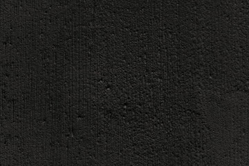 Abstract grunge black cement wall textured or Dark black rough concrete surface background