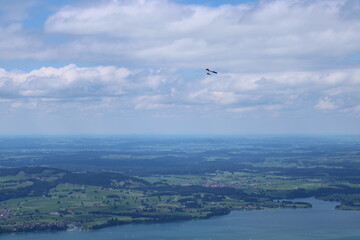 Fototapeta na wymiar Enjoying the great panoramic view while flying along the Allgau alps. 