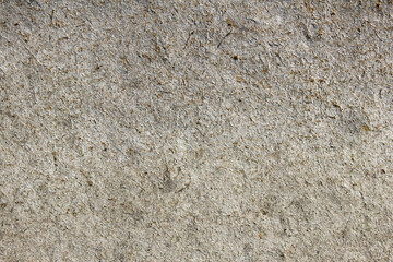Wood dust and cork texture with different colors and organic fibers. Surface discarded by dry moisture and full of scratches and cracks. Background texture. Abstract art.