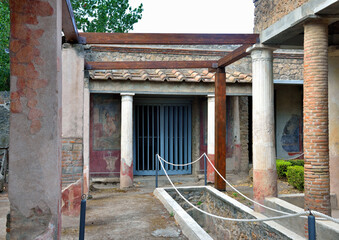 Ruins of Ancient Roman city of Pompei, Italy. Pompei was destroyed and buried with ash after...