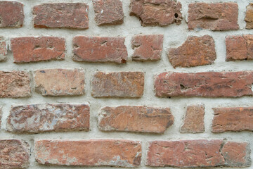 background old stone cracked red brown brick wall