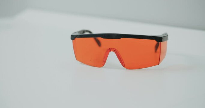 Safety glasses for doctors, on the table